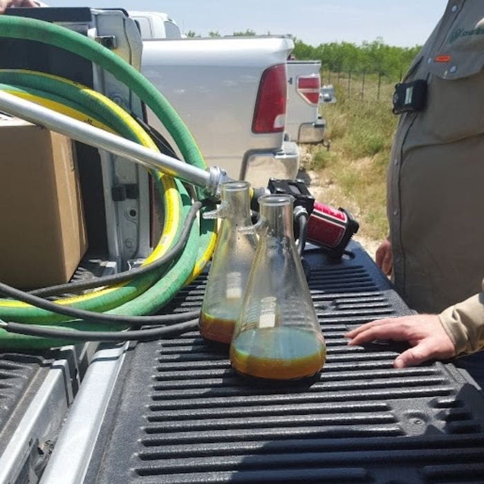 chemical samples on a truck bed in the oilfield